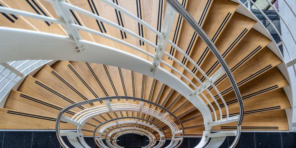 A beautiful shot of the stairs with a spiral staircase