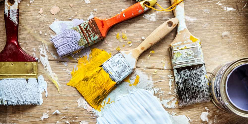 Flat lay of brushes isolated on white background
